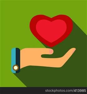 Pink heart in hand icon. Flat illustration of pink heart in hand vector icon for web design. Pink heart in hand icon, flat style