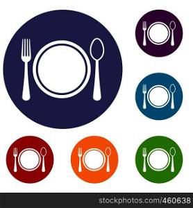 Place setting with plate,spoon and fork icons set in flat circle reb, blue and green color for web. Place setting with plate,spoon and fork icons set
