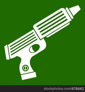 Plastic gun toy icon white isolated on green background. Vector illustration. Plastic gun toy icon green