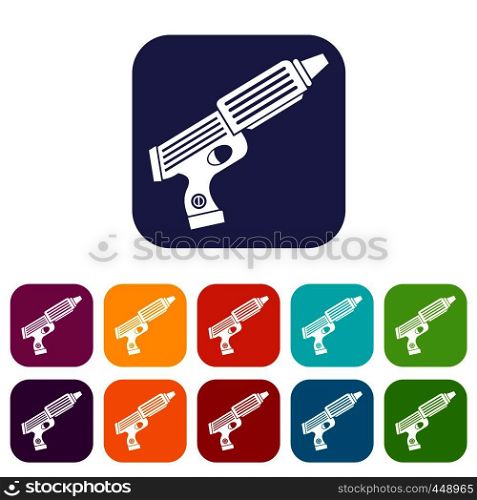 Plastic gun toy icons set vector illustration in flat style In colors red, blue, green and other. Plastic gun toy icons set flat