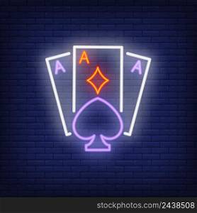 Playing ace cards neon sign. Diamond, spade, brick wall. Night bright advertisement. Vector illustration in neon style for gambling, casino and poker club