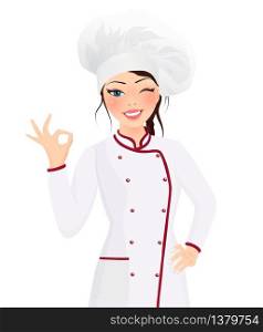 Portrait beautiful smiling young brunette woman cook wearing hat and chef uniform making ok sign gesture looking at the camera. Influencer. Cooking class. Video tutorial