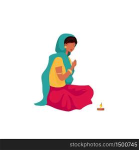 Praying indian girl flat color vector faceless character. Female in sari and scarf. Religious hindu ritual. Puja ceremony isolated cartoon illustration for web graphic design and animation. Praying indian girl flat color vector faceless character