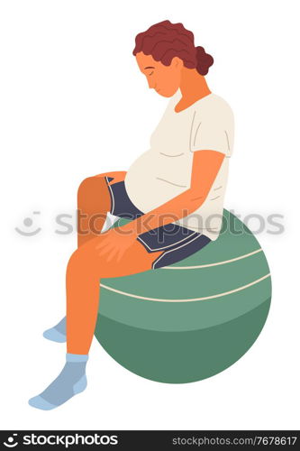Pregnant woman in white T-shirt and shorts sits on green big fitness ball, relaxes, meditates. Maternity, childbirth, labor. Exercises for pregnant women. Woman with big belly isolated on white. Pregnant woman sits on fitness ball with head bowed. Relaxation exercises for pregnant women