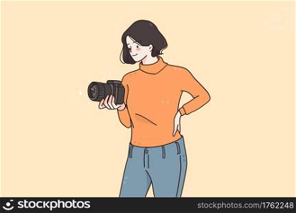 Professional photographer and equipment concept. Young smiling woman photographer cartoon character in casual clothing standing with camera making shot vector illustration . Professional photographer and equipment concept