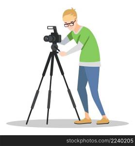 Professional photographer semi flat RGB color vector illustration. Mass media occupation. Young man in glasses with photo camera on tripod isolated cartoon character on white background. Professional photographer semi flat RGB color vector illustration