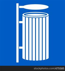 Public trash can icon white isolated on blue background vector illustration. Public trash can icon white