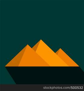 Pyramids of Egypt icon in flat style on a blue background . Pyramids of Egypt icon, flat style
