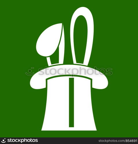 Rabbit appearing from a top magic hat icon white isolated on green background. Vector illustration. Rabbit appearing from a top magic hat icon green