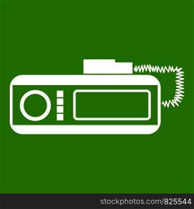 Radio taxi icon white isolated on green background. Vector illustration. Radio taxi icon green