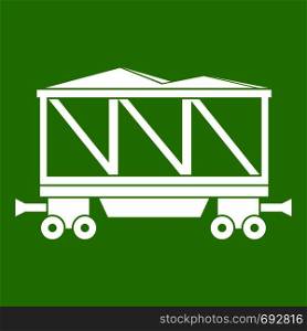 Railway wagon icon white isolated on green background. Vector illustration. Railway wagon icon green