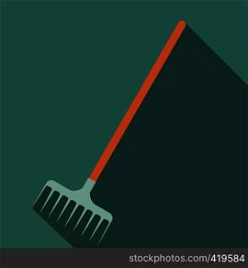 Rake icon with shadow on a green background. Rake icon with shadow