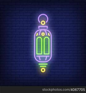Ramadan lantern neon sign. Ornate traditional lamp on dark brick wall background. Night bright advertisement. Vector illustration in neon style for Ramadan month or Muslim holiday