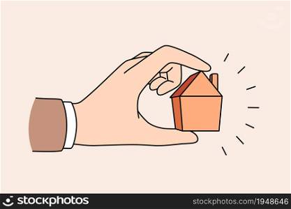 Real estate and apartment concept. Human hand holding little tine house apartment for sale or rent vector illustration. Real estate and apartment concept
