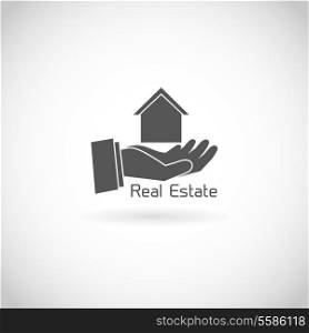 Real estate symbol human hand holding house silhouette isolated on white background vector illustration