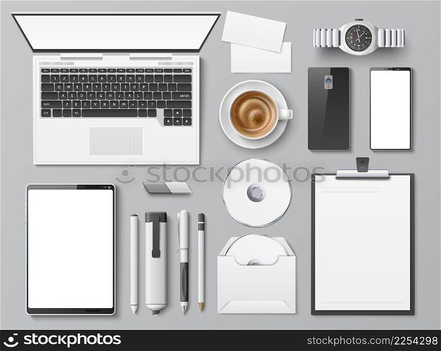 Realistic desktop top view. Office workplace with different supplies. Digital device. Stationery or paper tablet. Coffee cup. Visit cards. Computer disk. Vector set of blank business identity mockup. Realistic desktop top view. Office workplace with different supplies. Digital device. Stationery or tablet. Coffee cup. Visit cards. Computer disk. Vector set of business identity mockup