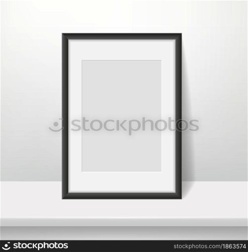 Realistic frame on wall background. Blank framed picture or poster mockup, dark plastic border with paspartu, vertical a4 photo format, interior design simple decorative accessory, vector concept. Realistic frame on wall background. Blank framed picture or poster mockup, dark plastic border with paspartu, vertical a4 photo format, interior design accessory, vector concept