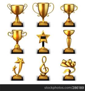 Realistic golden trophy cups and sports awards vector set. Triumph sport award and prize, winner trophy gold cup illustration. Realistic golden trophy cups and sports awards vector set