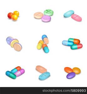 Realistic Pills Icons Set. Realistic pills and capsules in different colors icons set isolated vector illustration