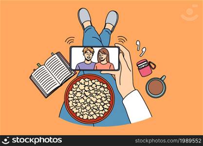Recreation activity and leisure concept. Top view of human hands holding smartphone with movie on screen popcorn and coffee vector illustration . Recreation activity and leisure concept.