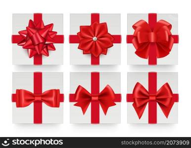 Red bows top view. Realistic gift bow with ribbon. White present boxes decorations vector set. Illustration gift surprise to christmas holiday and birthday. Red bows top view. Realistic gift bow with ribbon. White present boxes decorations vector set