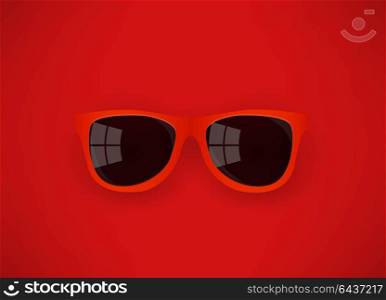 red sunglasses on red background