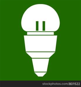 Reflector bulb icon white isolated on green background. Vector illustration. Reflector bulb icon green