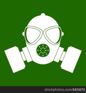 Respirator icon white isolated on green background. Vector illustration. Respirator icon green