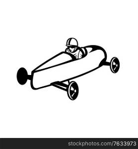 Retro black and white style illustration of a soap box derby or soapbox car racer racing in competition viewed from side on high angle on isolated white background.. Soap Box Derby or Soapbox Car Racer Racing Side Retro Black and White