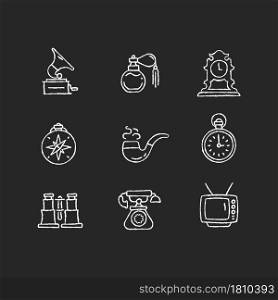 Retro items chalk white icons set on dark background. Phonograph records. Vintage perfume. Tabletop clock. Compass. Smoking pipe. Field glasses. Isolated vector chalkboard illustrations on black. Retro items chalk white icons set on dark background