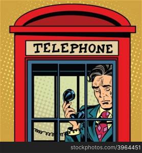 Retro man crying in a phone booth pop art retro vector. The love and emotions. Talking on the phone. Retro phone. Red telephone booth vector. Retro man crying in a phone booth