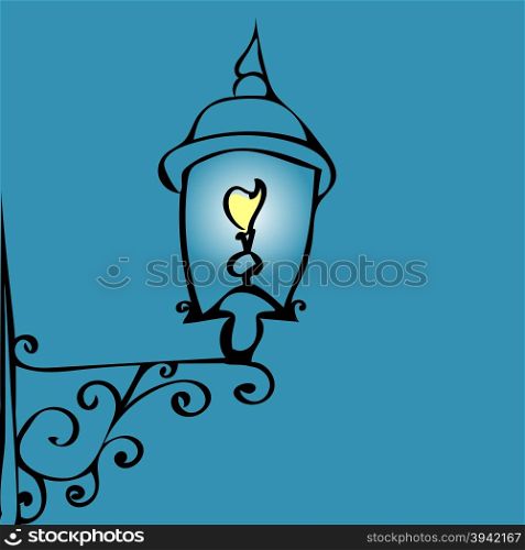 Retro street lantern. Public lighting. The night and darkness. Forged openwork decorative element. Retro street lantern