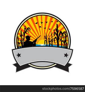 Retro style illustration of a duck or bird hunter with rifle in flooded cornfield with corn stalks set inside circle with sunburst on isolated background.. Duck Hunter in Cornfield Circle Retro