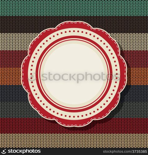 Retro style vintage label over a knitted background