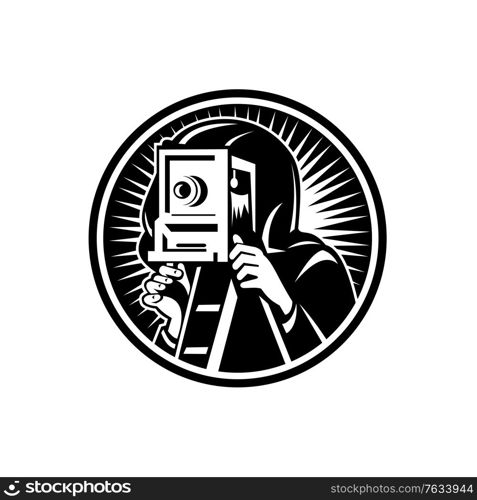 Retro woodcut style illustration of a photographer shooting taking photo using a vintage box camera viewed from front set inside circle on isolated background done in black and white.. Photographer Taking Photo Using Vintage Box Camera Retro Woodcut Black and White