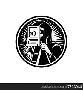 Retro woodcut style illustration of a photographer shooting taking photo using a vintage box camera viewed from front set inside circle on isolated background done in black and white.. Photographer Taking Photo Using Vintage Box Camera Retro Woodcut Black and White
