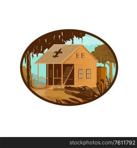 Retro wpa style illustration of a typical Cajun house, a country French architecture found in Louisiana and across the American southeast and alligator or gator set inside oval on isolated background.. Cajun House and Gator Oval WPA Retro