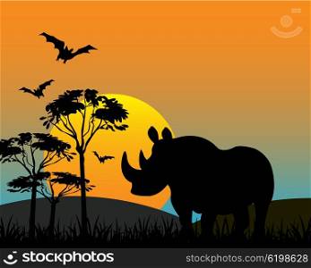 Rhinoceros in savannah. The Silhouette of the wildlife rhinoceros in savannah.Vector illustration
