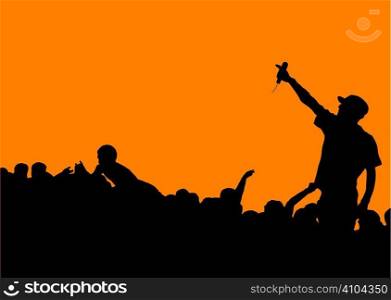 Rock concert with singer talking to the crowd on an orange background