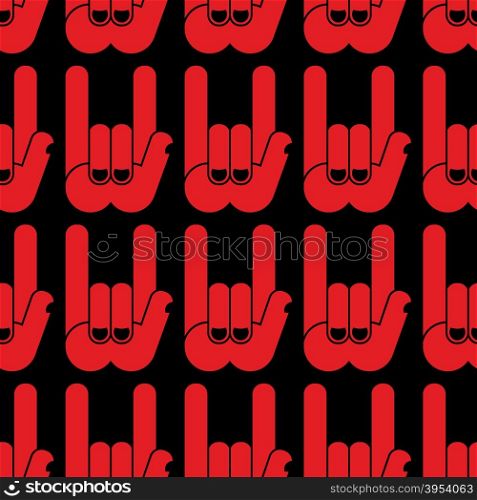 Rock hand sign seamless pattern. Black background and red hands. Rock and roll Textur. &#xA;