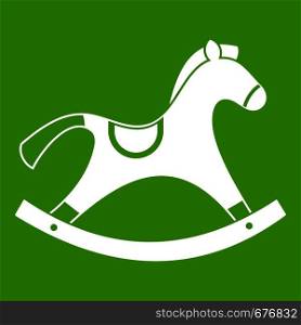 Rocking horse icon white isolated on green background. Vector illustration. Rocking horse icon green