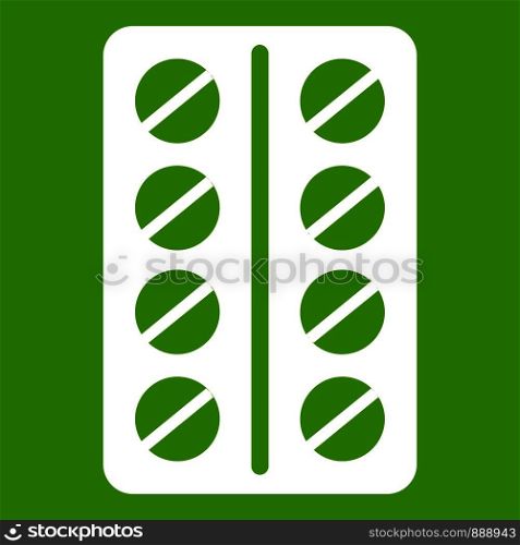Round pills in a blister pack icon white isolated on green background. Vector illustration. Round pills in a blister pack icon green