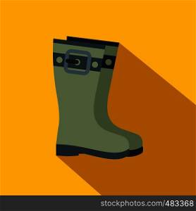 Rubber boots flat icon on a yellow background. Rubber boots flat icon