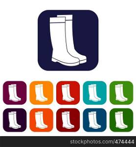 Rubber boots icons set vector illustration in flat style In colors red, blue, green and other. Rubber boots icons set