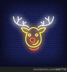 Rudolph neon Christmas reindeer cartoon character. Night bright advertisement element. Neon festive design for New Year, Christmas, celebration, greeting cards