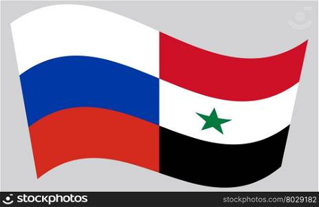 Russian and Syrian flags waving on gray background. Russian and Syrian flags waving