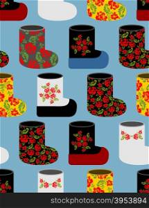 Russian traditional winter shoes seamless pattern. Valenki background. Flower ornament national footwear in Russia.&#xA;