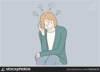 Sadness, mental depression, doubt concept. Young unhappy woman sitting touching head and feeling depressed with thoughts after negative events or having doubts about future . Sadness, mental depression, doubt concept