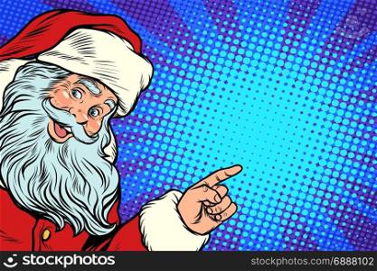 Santa Claus pointing to copy space. New year and Christmas. Pop art retro vector illustration. Santa Claus pointing to copy space