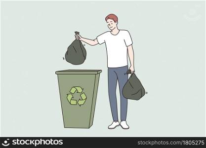 Saving ecology and recycling concept. Young smiling man cartoon character standing holding trash bags separated for recycling vector illustration . Saving ecology and recycling concept